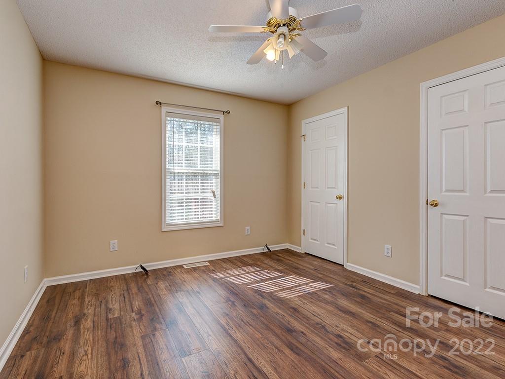3488 State Rd S-29-330 Lancaster, SC 29720 - Photo 18 of 25 a view of an empty room with wooden floor and a window