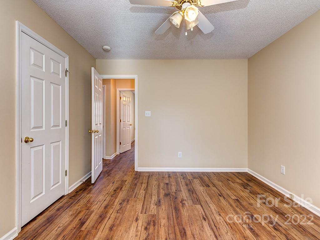 3488 State Rd S-29-330 Lancaster, SC 29720 - Photo 19 of 25 wooden floor in an empty room with a window