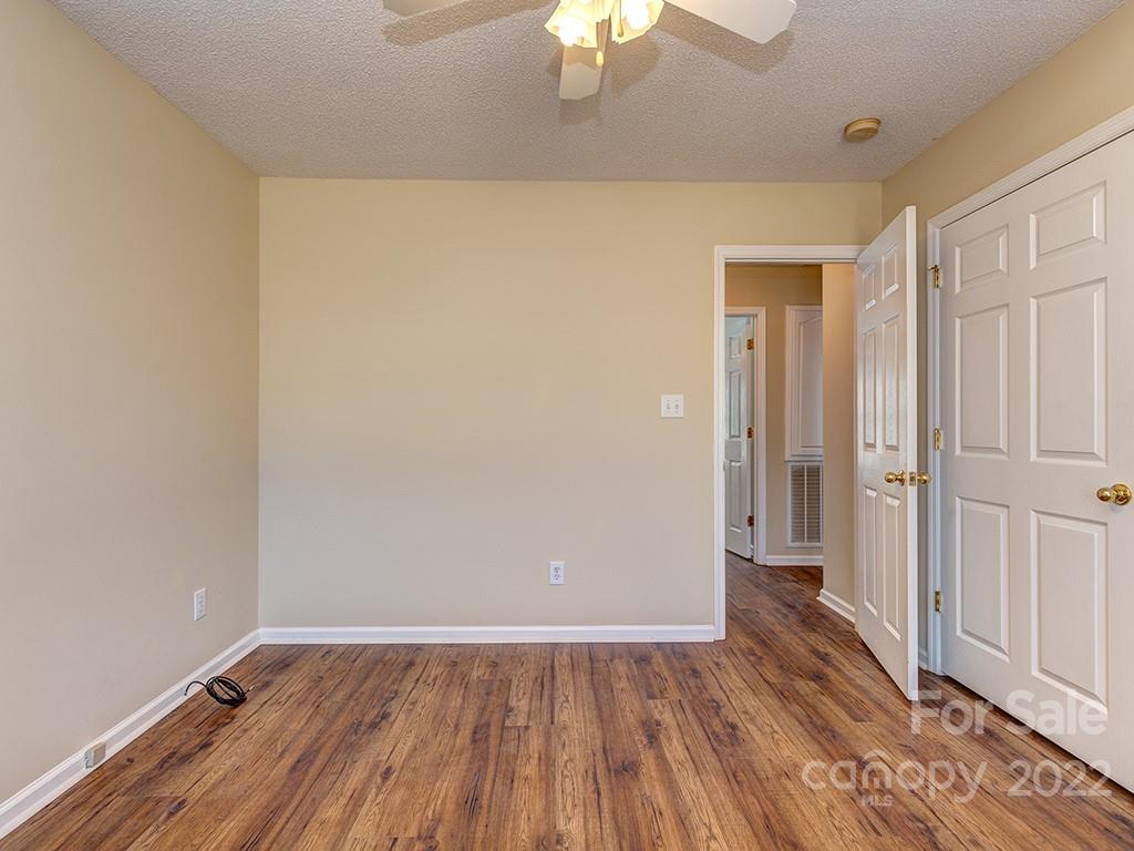3488 State Rd S-29-330 Lancaster, SC 29720 - Photo 22 of 25 a view of an empty room with wooden floor