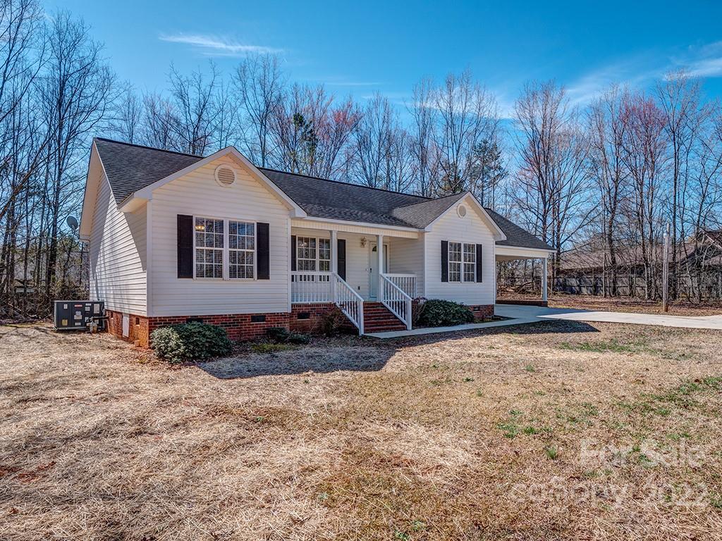 3488 State Rd S-29-330 Lancaster, SC 29720 - Photo 3 of 25 a front view of a house with a yard