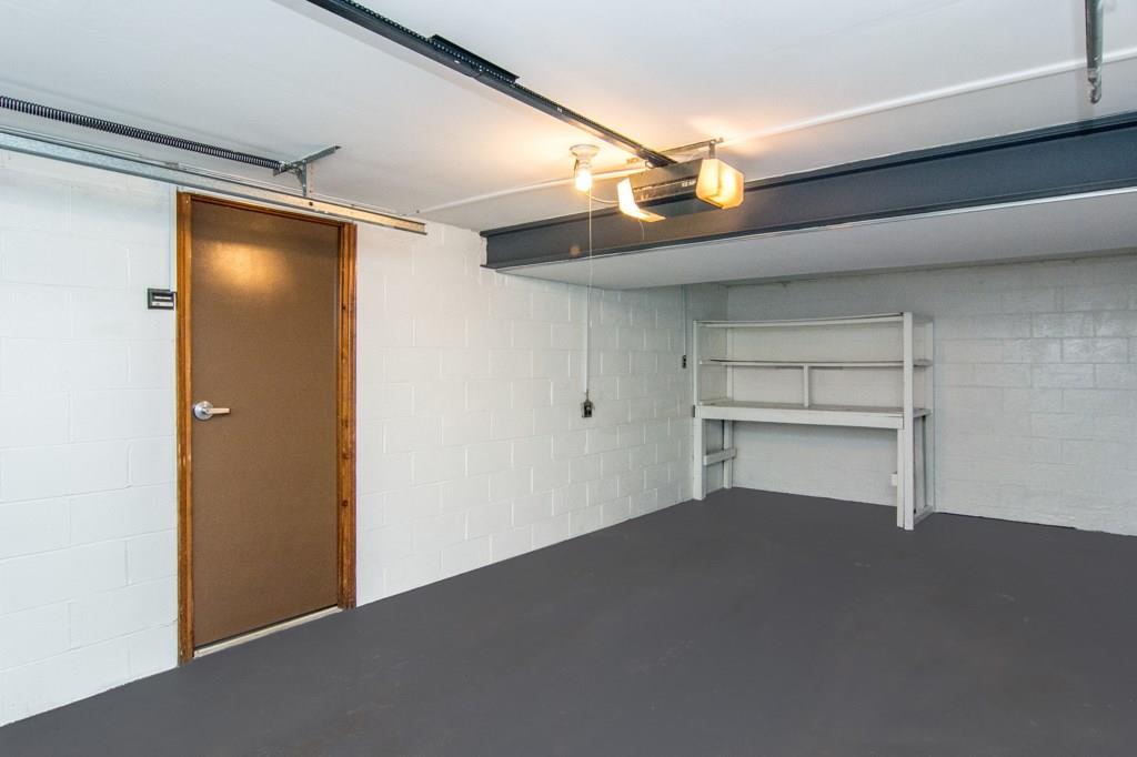 22 Highbury Road Cheswick, PA 15024 - Photo 22 of 22 ANOTHER VIEW OF GARAGE WITH STORAGE SHELVES