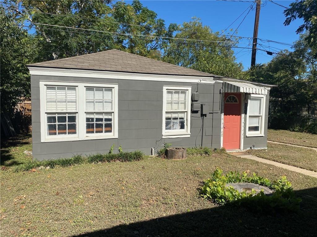 1020 Ellingson Lane, Unit B Austin, TX 78751 - Photo 1 of 1 View of front of home with a front yard and roof with shingles