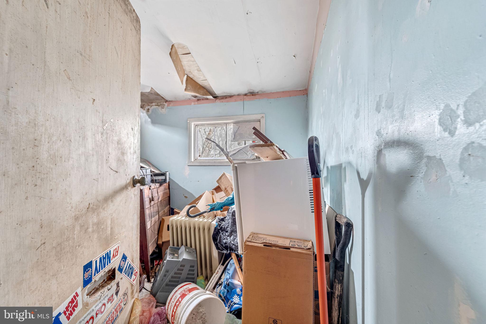 331 Collins Lane Maple Shade, NJ 08052 - Photo 11 of 17 a bedroom with a bed and a chandelier