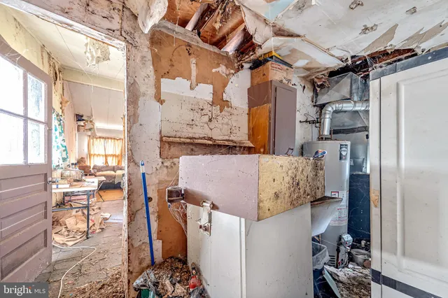 a view of living room with furniture and a window