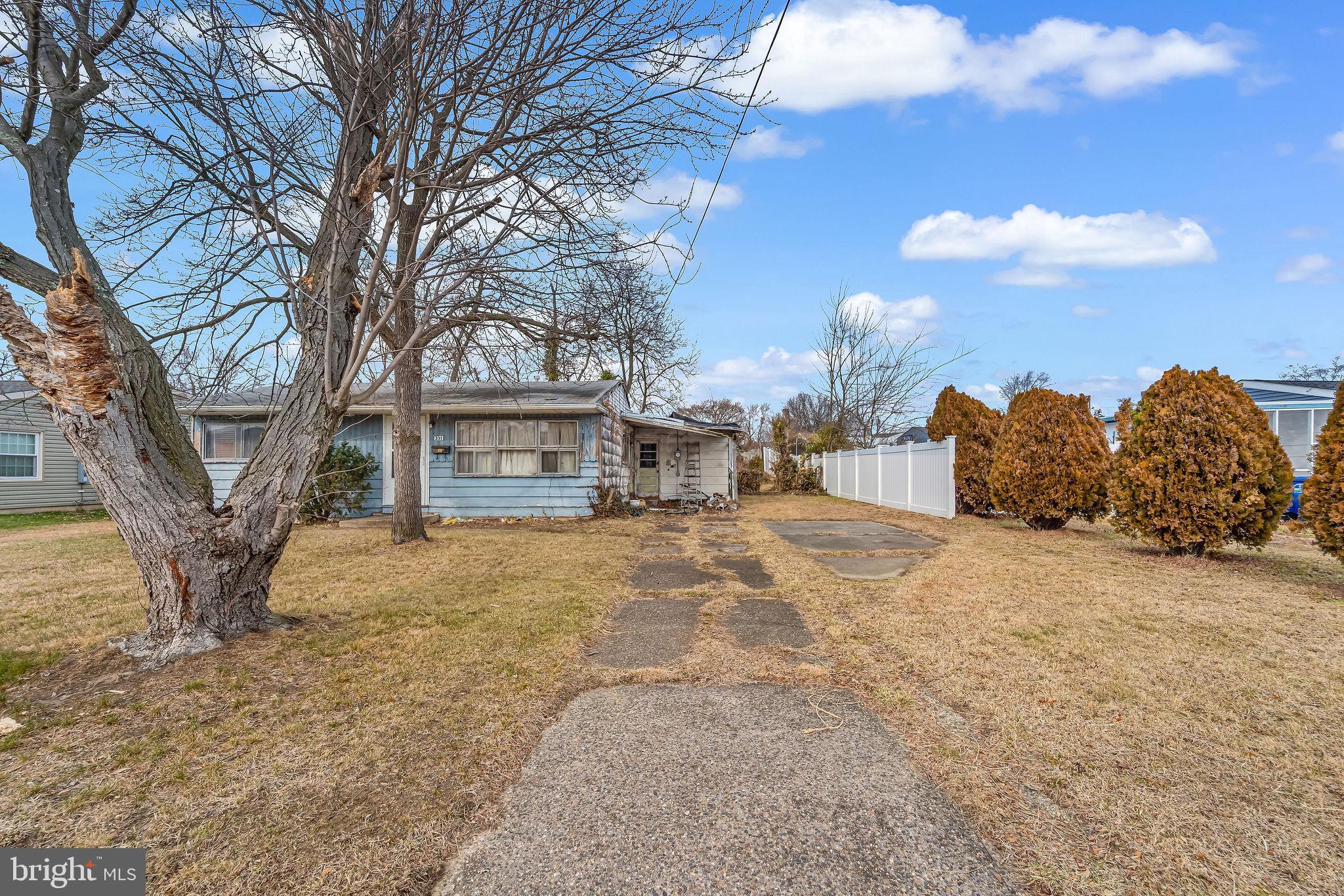 331 Collins Lane Maple Shade, NJ 08052 - Photo 4 of 17 a view of a house with a snow in the yard