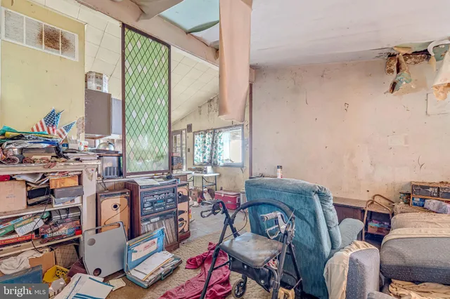 a room with furniture and a window