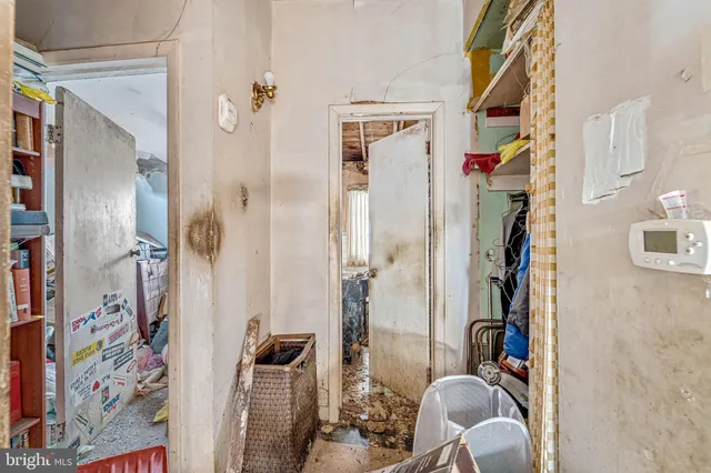 a bathroom with a shower and a mirror