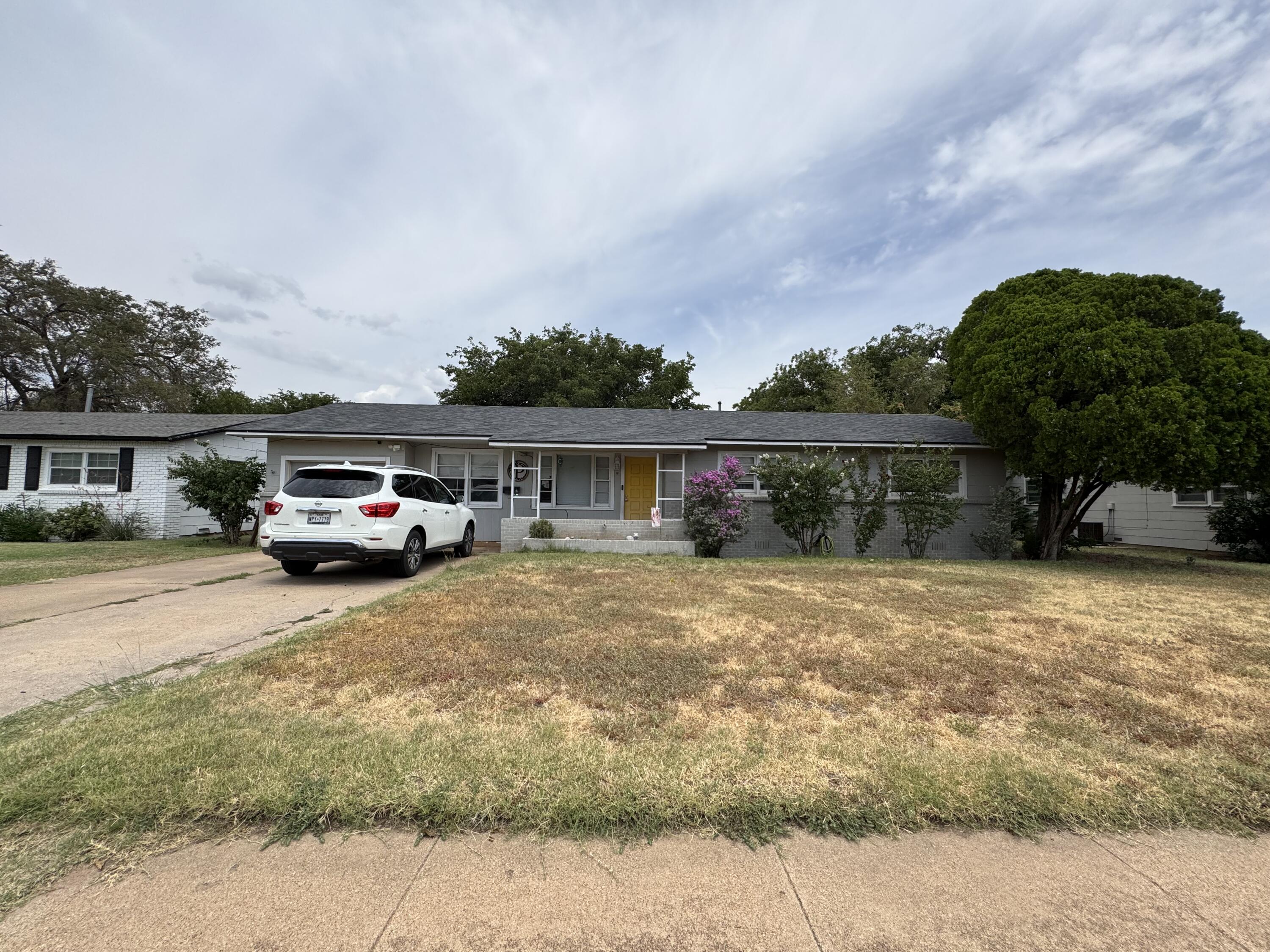 3808 37th Street Lubbock, TX 79413 - Photo 1 of 19 a house view with a garden space