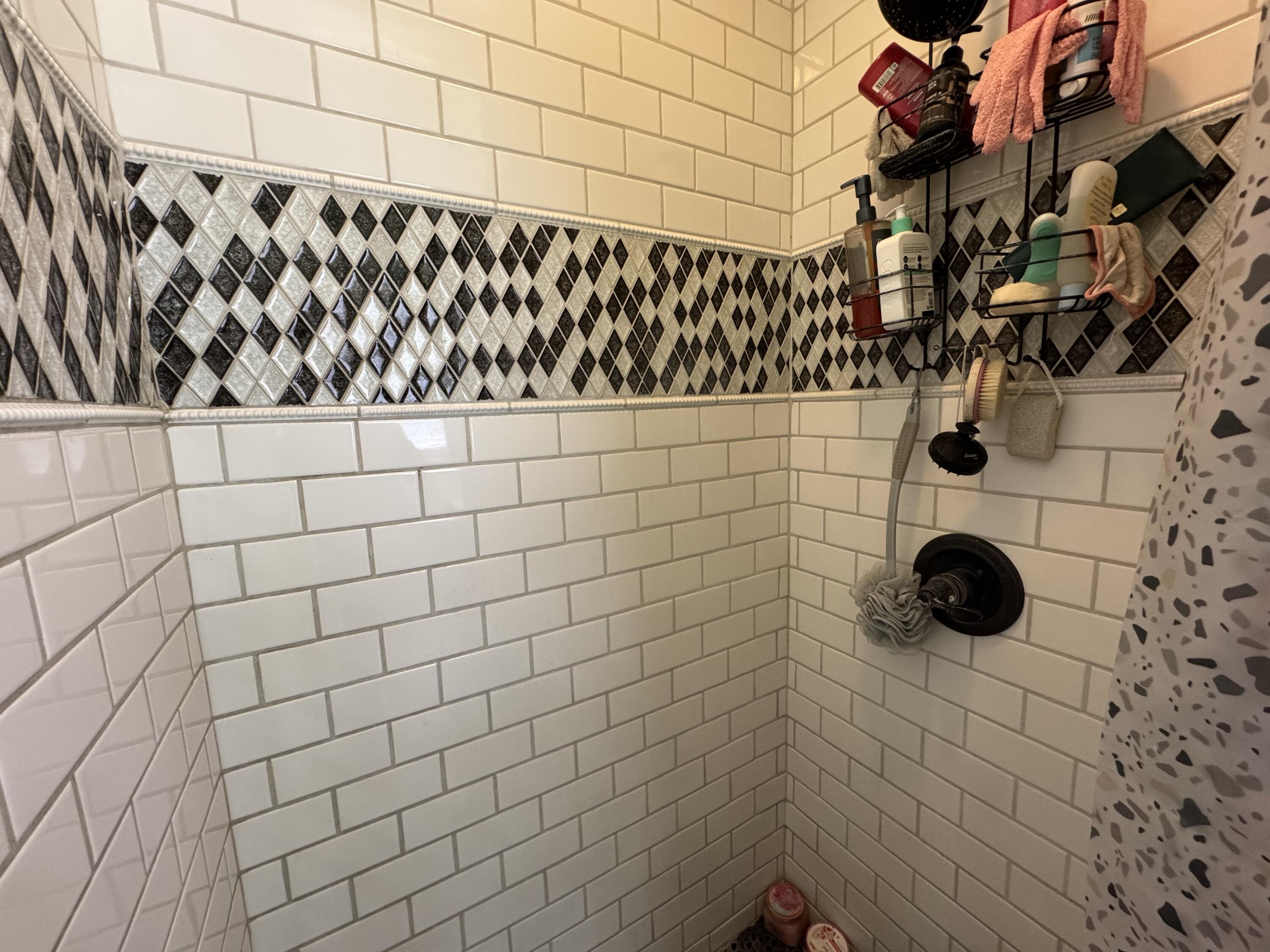 3808 37th Street Lubbock, TX 79413 - Photo 7 of 19 a bathroom with a shower