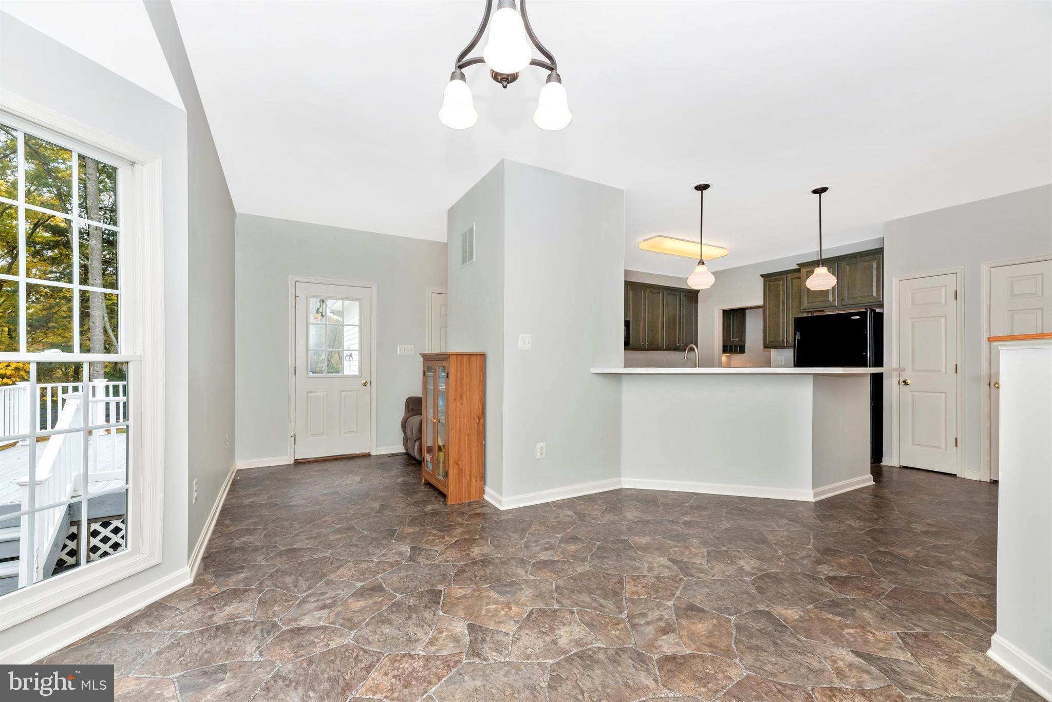12551 New Windsor Road Union Bridge, MD 21791 - Photo 17 of 47 Breakfast Nook with door to deck