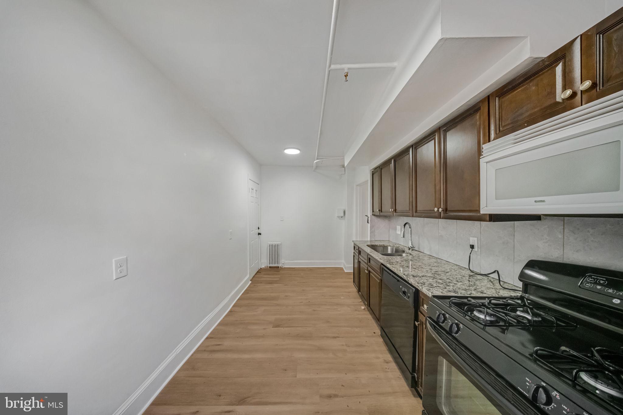 337 Delafield Place Northwest Washington, DC 20011 - Photo 7 of 72 Modern kitchen with sleek finishes.