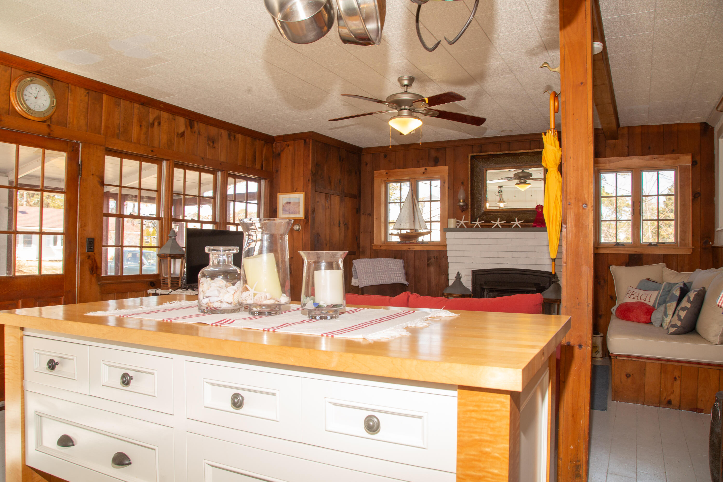 10 Wixon Road Dennis Port, MA 02639 - Photo 14 of 25 a view of a kitchen with granite countertop a sink a stove and cabinets