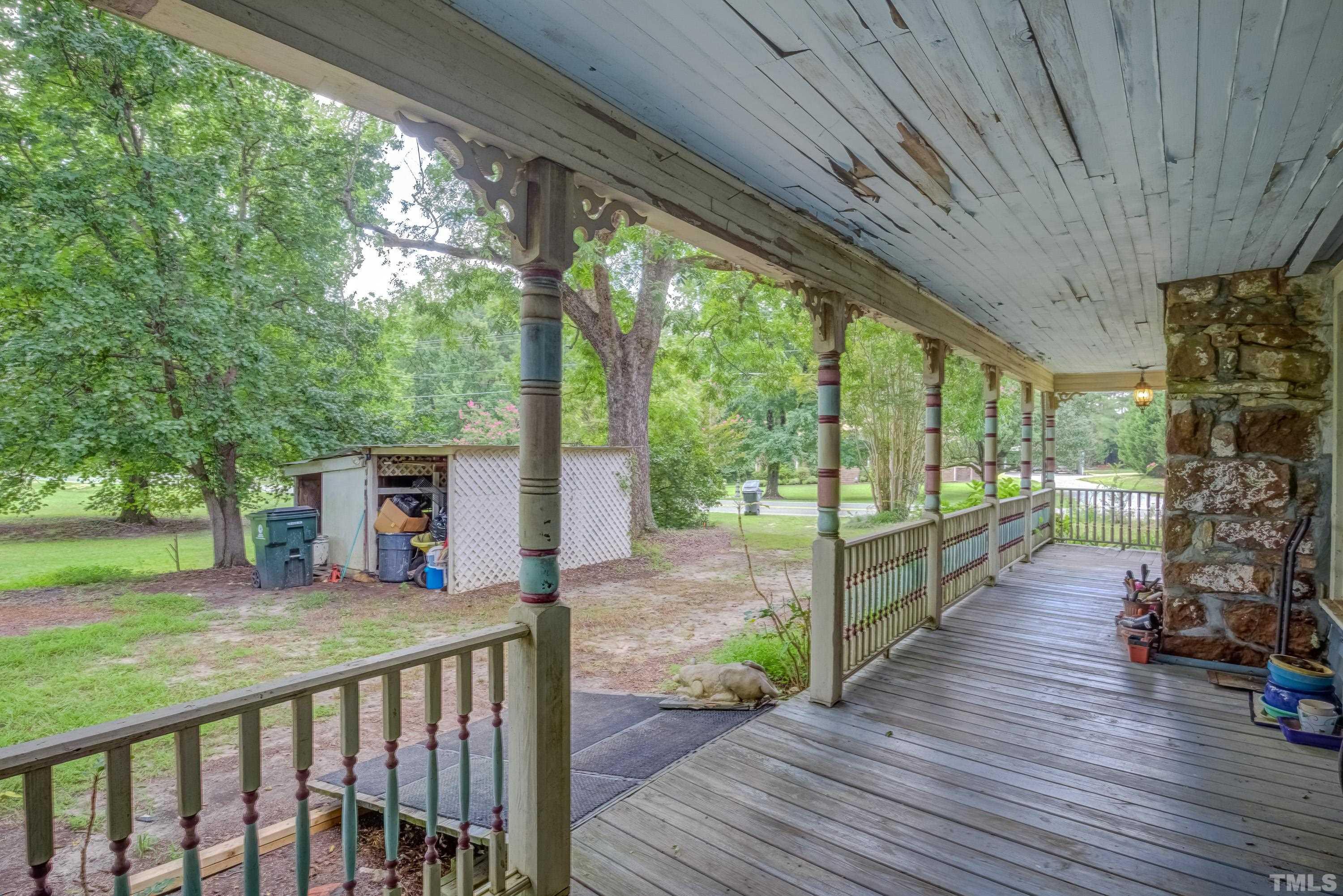 3614 Carpenter Pond Road Durham, NC 27703 - Photo 10 of 57 a view of a patio with wooden floor