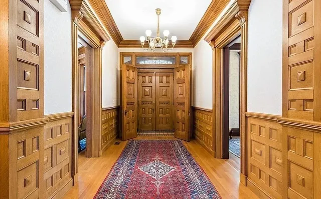 a view of a hallway with windows