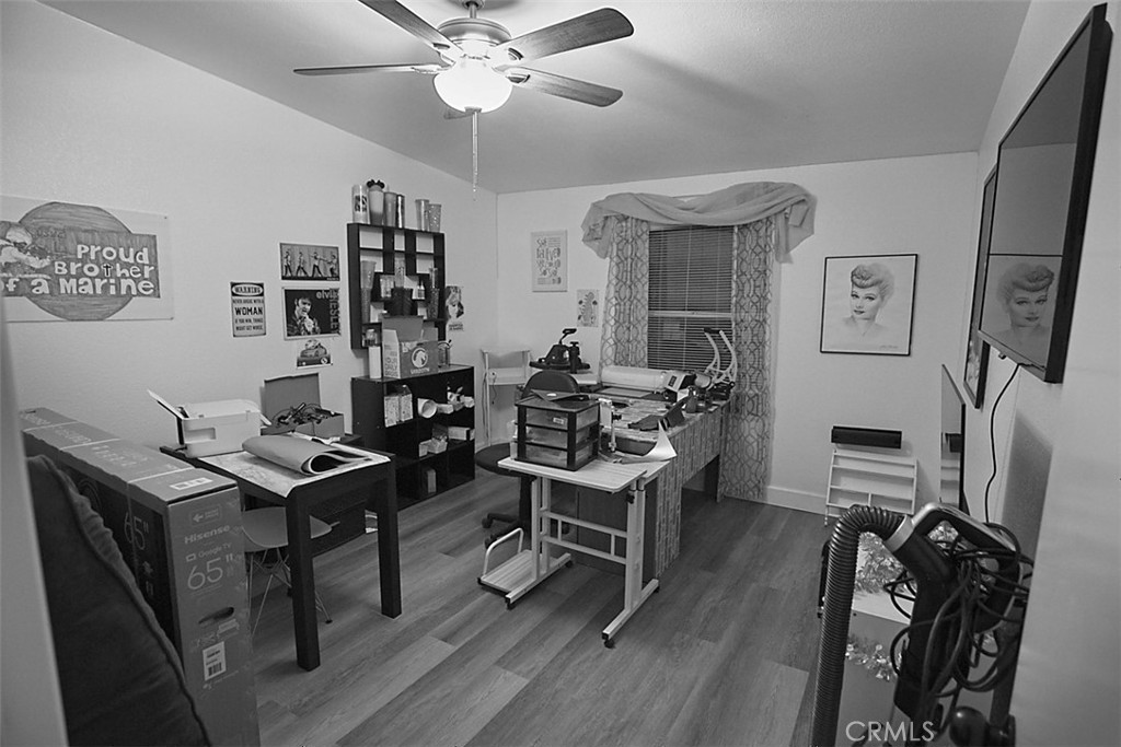 51490 Forest Boundary Road Anza, CA 92539 - Photo 30 of 32 a view of a workspace with furniture window and wooden floor