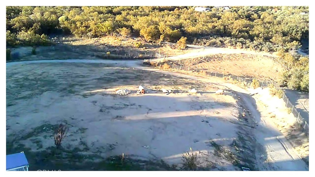 51490 Forest Boundary Road Anza, CA 92539 - Photo 32 of 32 a view of dirt field with large trees