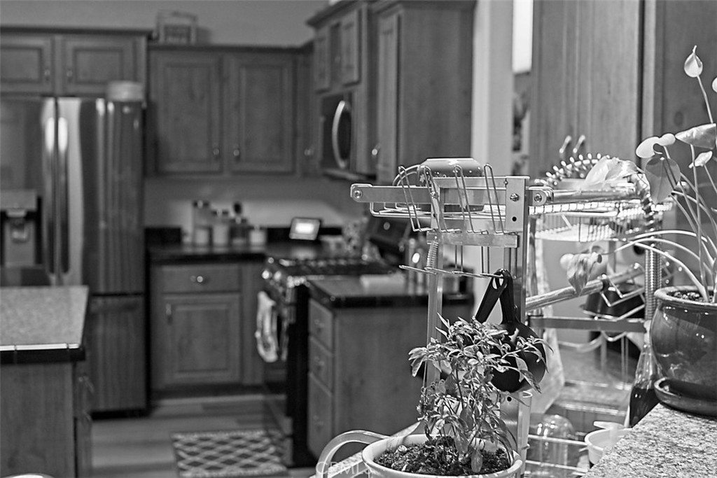 51490 Forest Boundary Road Anza, CA 92539 - Photo 4 of 32 a kitchen with lots of counter top space and cabinets