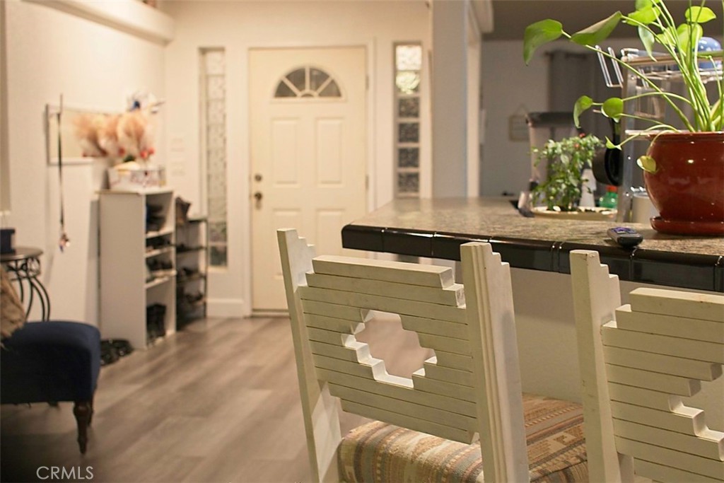 51490 Forest Boundary Road Anza, CA 92539 - Photo 6 of 32 a view of a hallway with workspace and wooden floor