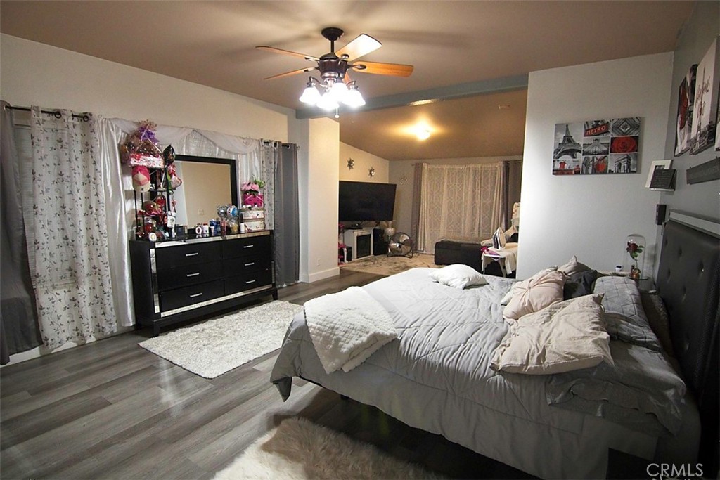 51490 Forest Boundary Road Anza, CA 92539 - Photo 7 of 32 a bedroom with a bed and a flat tv screen on dresser