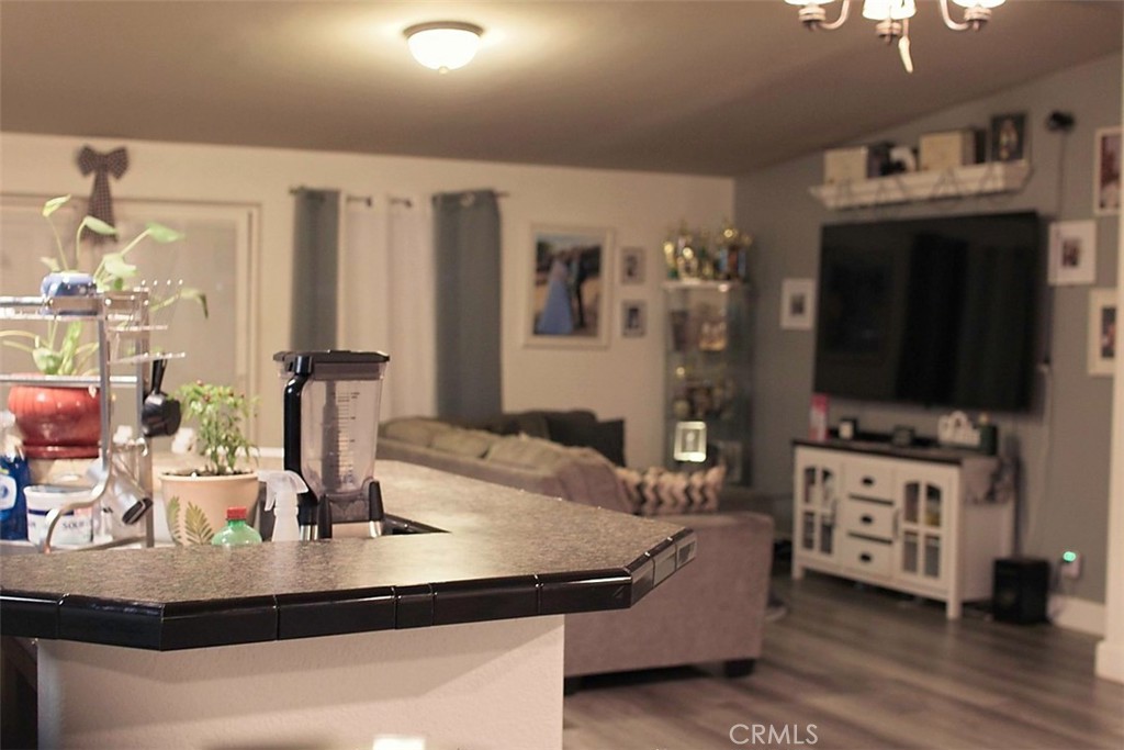 51490 Forest Boundary Road Anza, CA 92539 - Photo 9 of 32 a room with furniture and flat screen tv