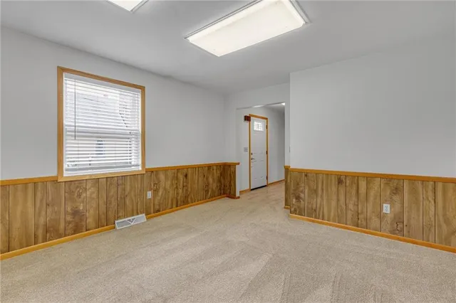 an empty room with windows