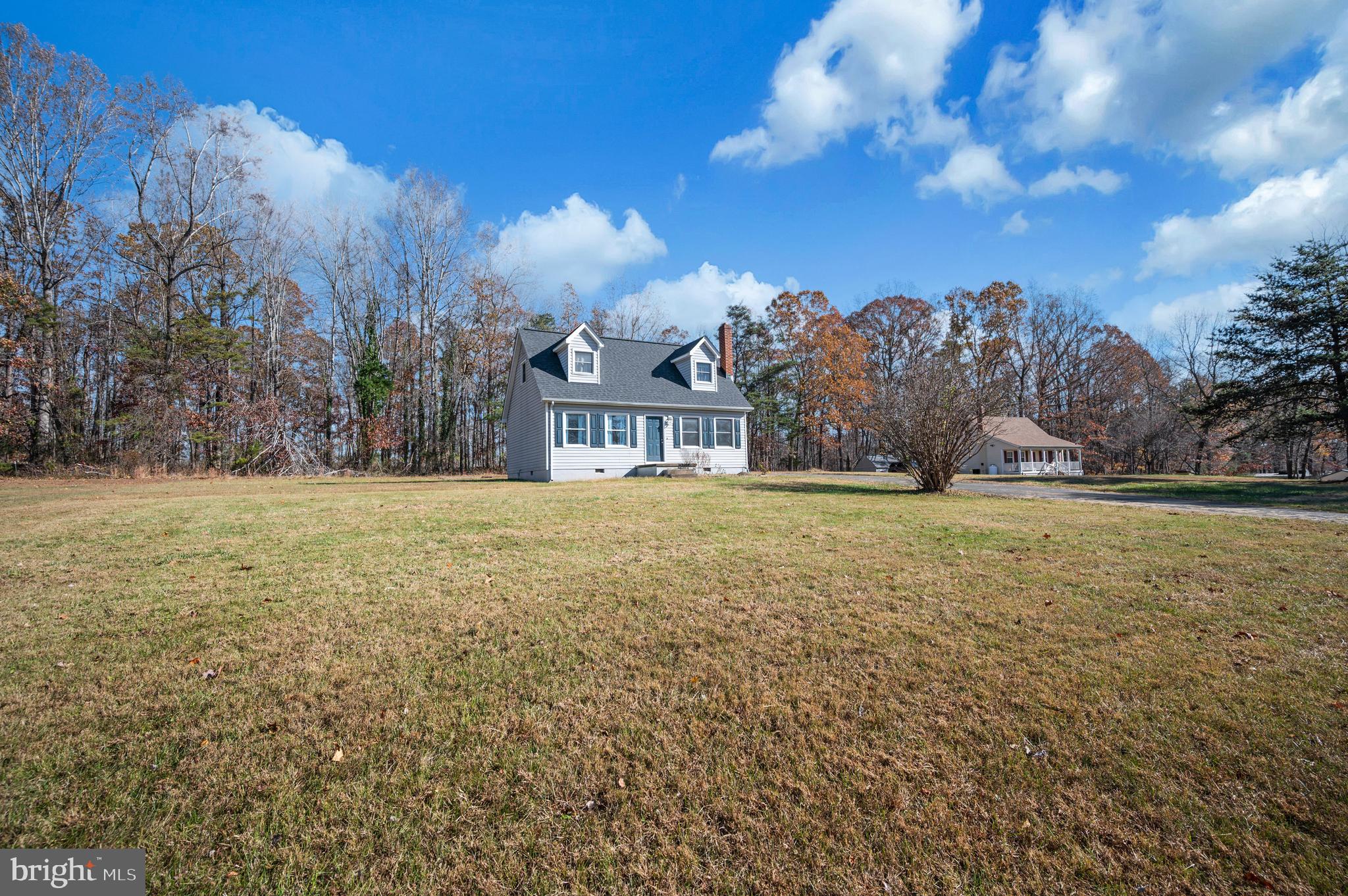 9577 Roys Lane Culpeper, VA 22701 - Photo 31 of 41 a view of house with outdoor space and trees in the background