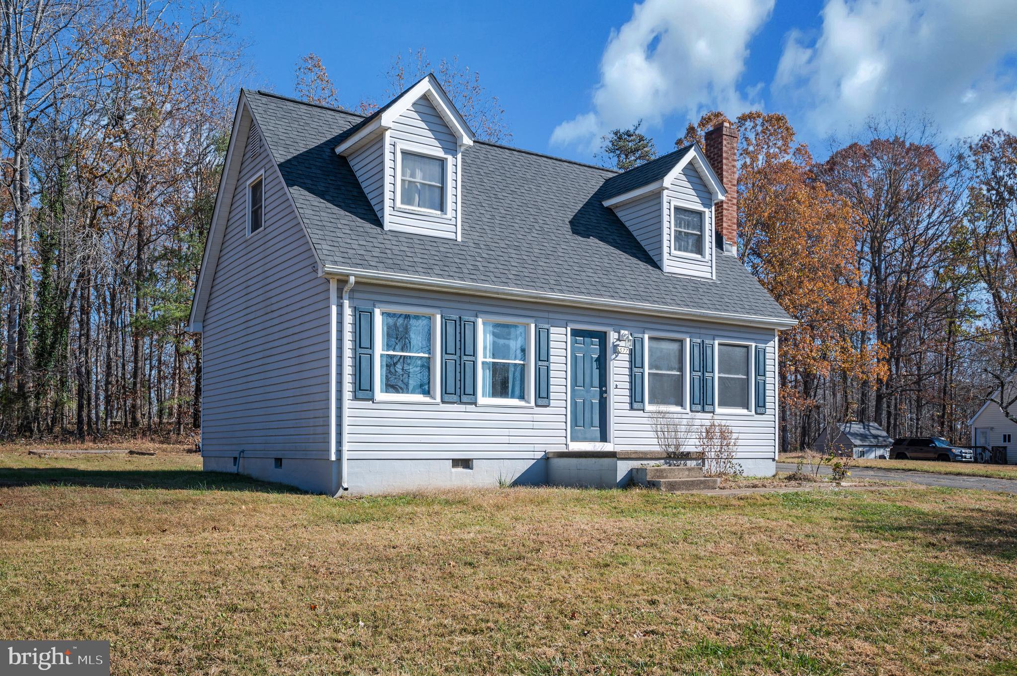 9577 Roys Lane Culpeper, VA 22701 - Photo 34 of 42 a front view of a house with a yard