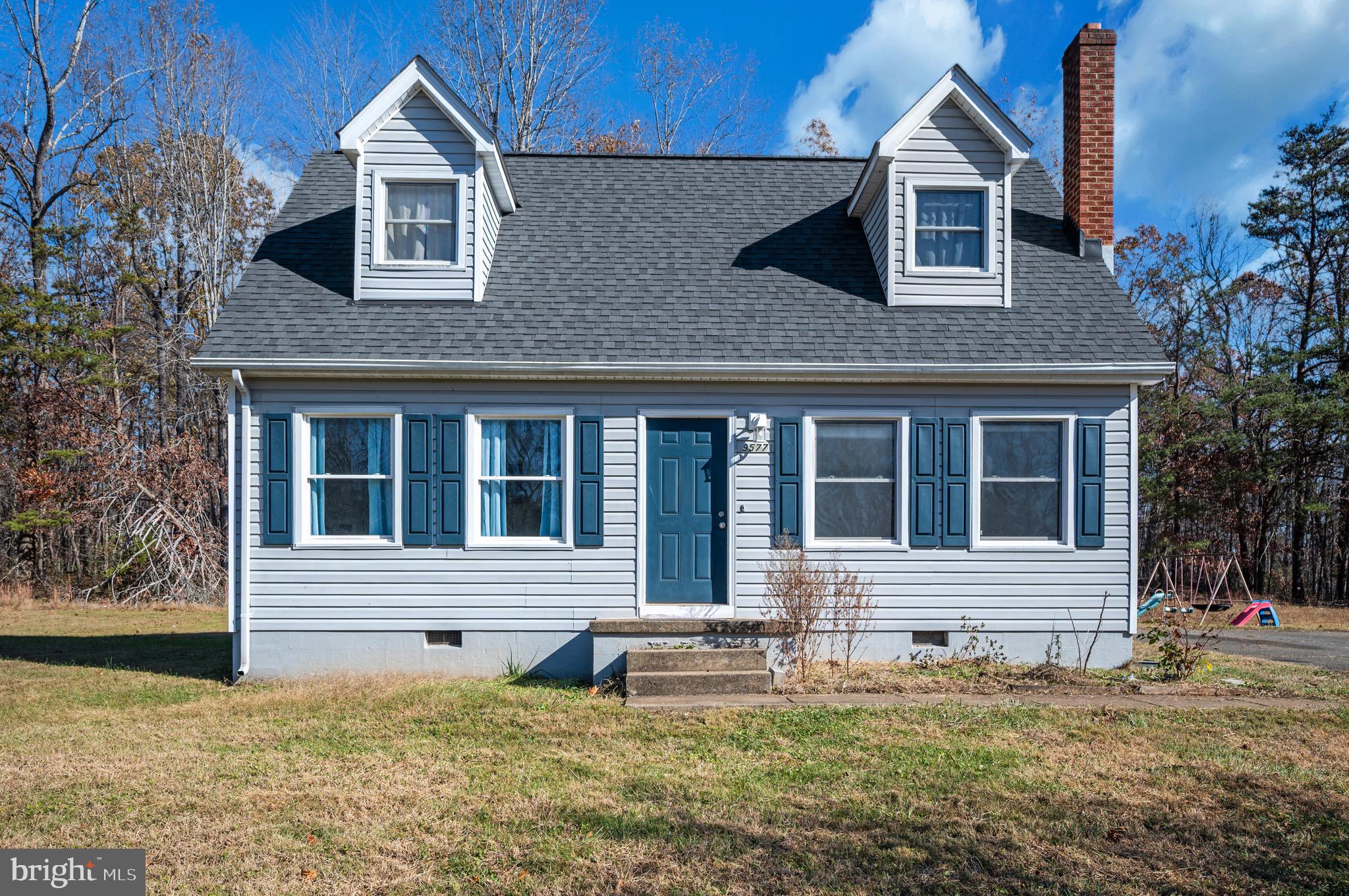 9577 Roys Lane Culpeper, VA 22701 - Photo 35 of 42 a front view of a house with a yard