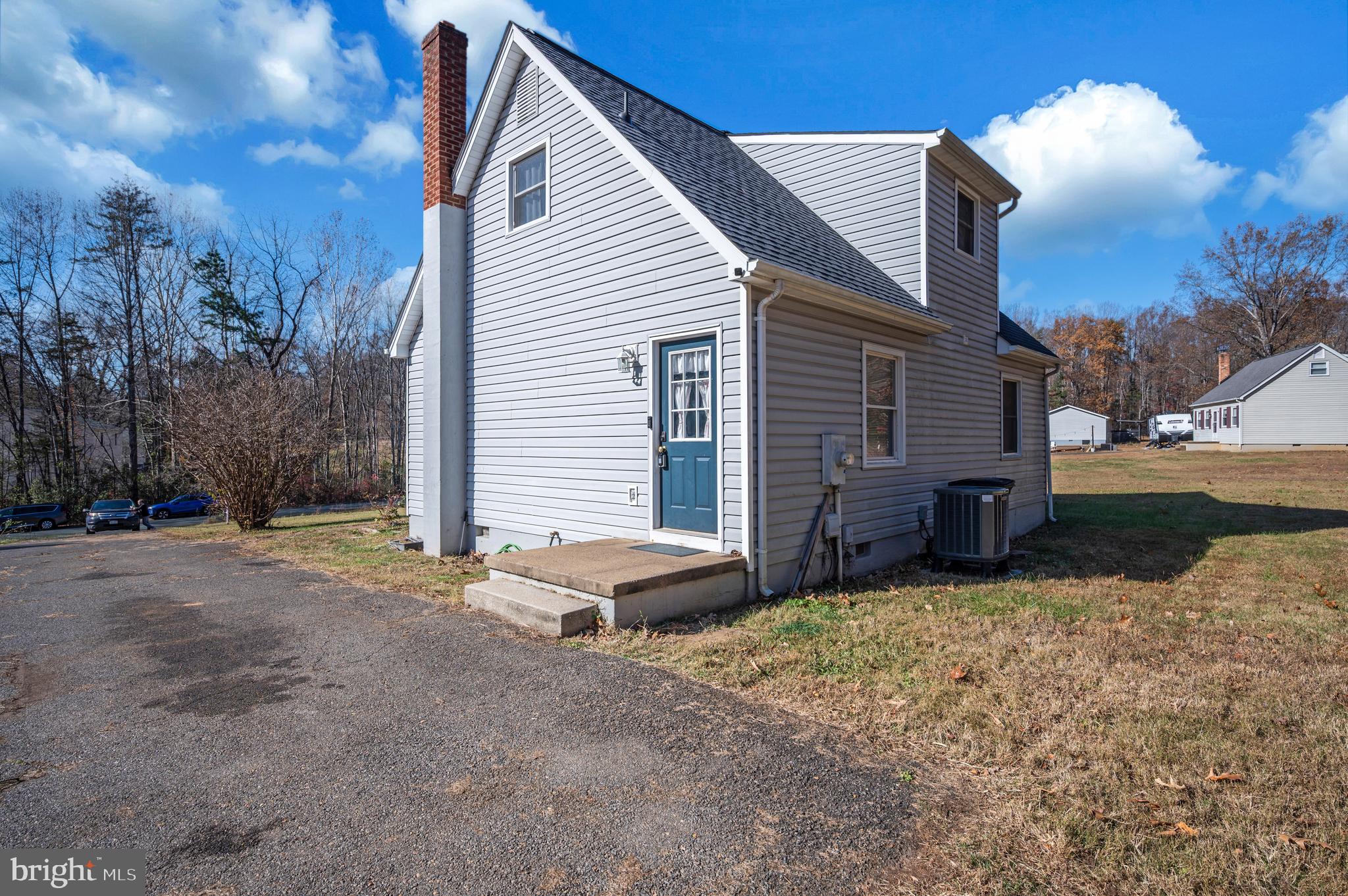 9577 Roys Lane Culpeper, VA 22701 - Photo 42 of 42 a view of a house with a yard
