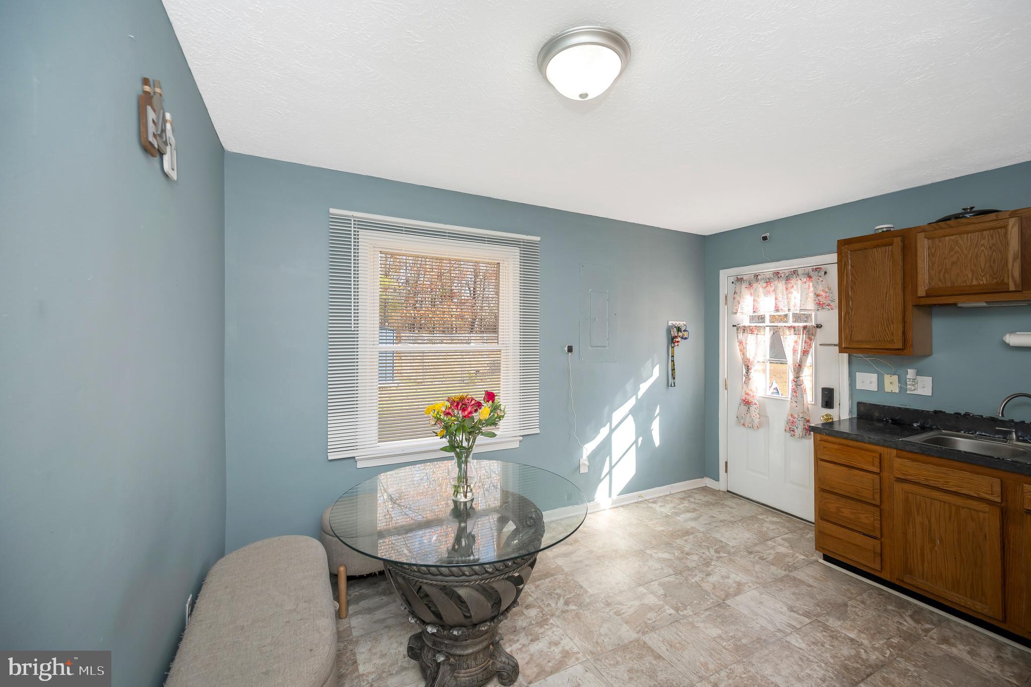 9577 Roys Lane Culpeper, VA 22701 - Photo 6 of 41 a living room with furniture and a wooden floor