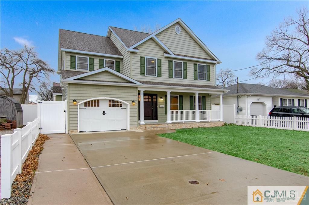 2231 Foster Road Point Pleasant, NJ 08742 - Photo 1 of 25 a front view of a house with a yard