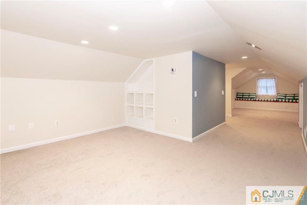 2231 Foster Road Point Pleasant, NJ 08742 - Photo 21 of 25 a view of a kitchen with a sink and a dishwasher with wooden floor