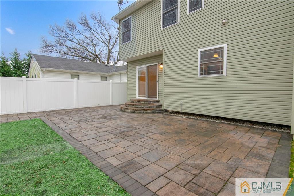2231 Foster Road Point Pleasant, NJ 08742 - Photo 24 of 25 a view of a house with a yard