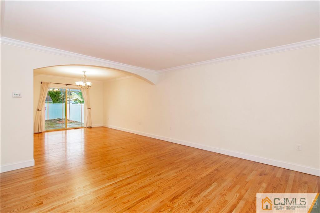 2231 Foster Road Point Pleasant, NJ 08742 - Photo 9 of 25 a view of empty room with wooden floor