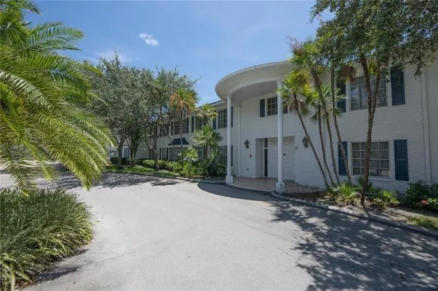 a view of a cafe with sitting area