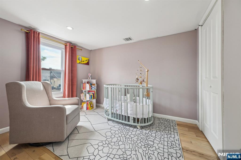 208 Jefferson Avenue Hasbrouck Heights, NJ 07604 - Photo 11 of 20 a living room with furniture and a window