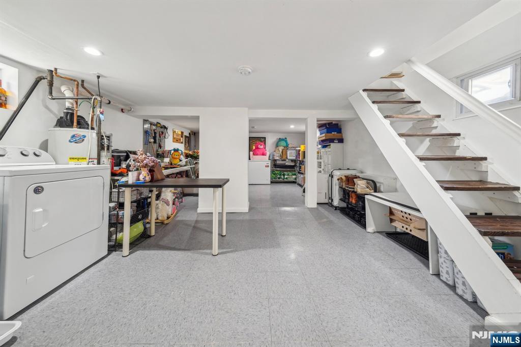 208 Jefferson Avenue Hasbrouck Heights, NJ 07604 - Photo 14 of 20 a storage room with washer and dryer