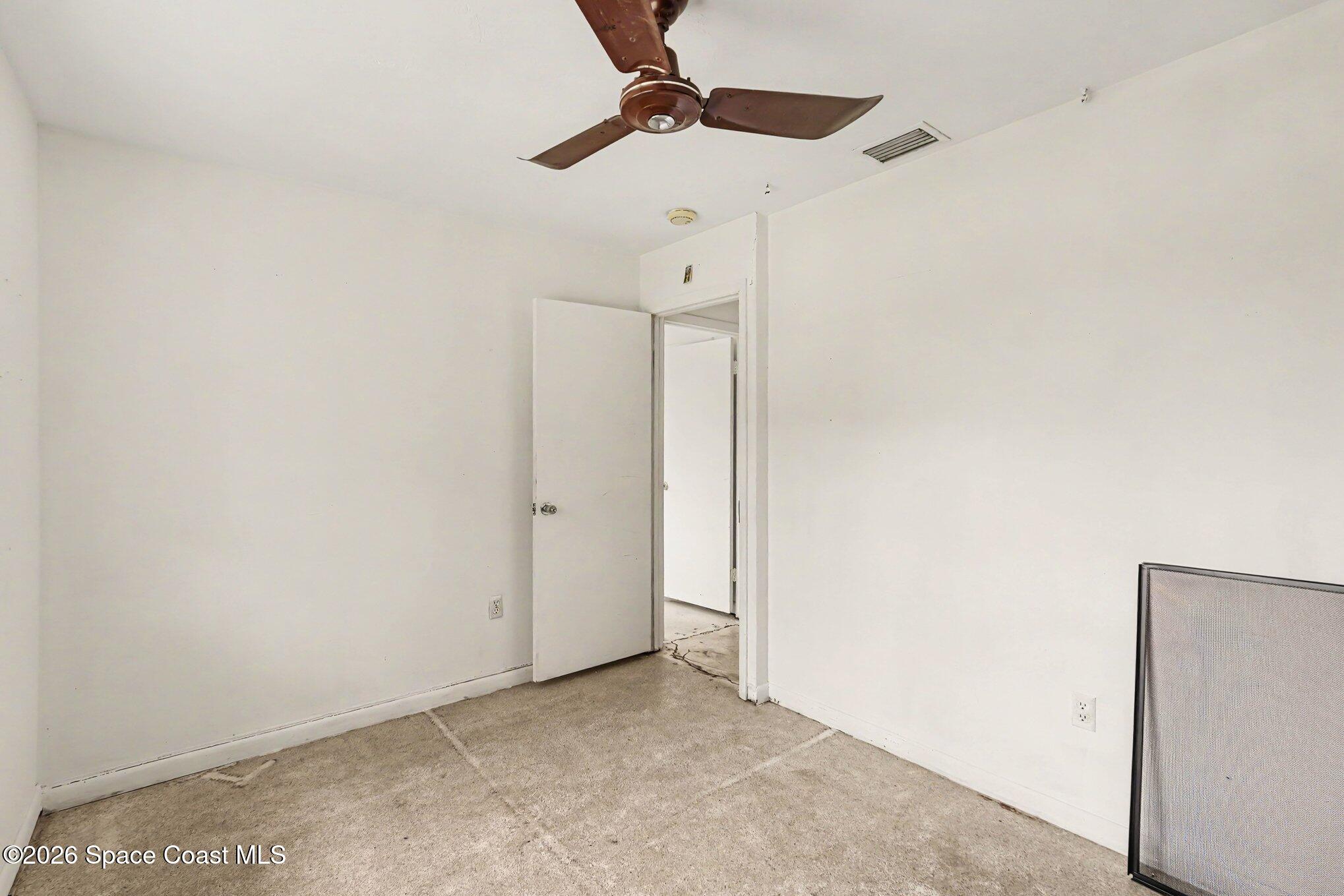 1406 Northeast Tropicana Road Palm Bay, FL 32905 - Photo 10 of 37 014_file_2252