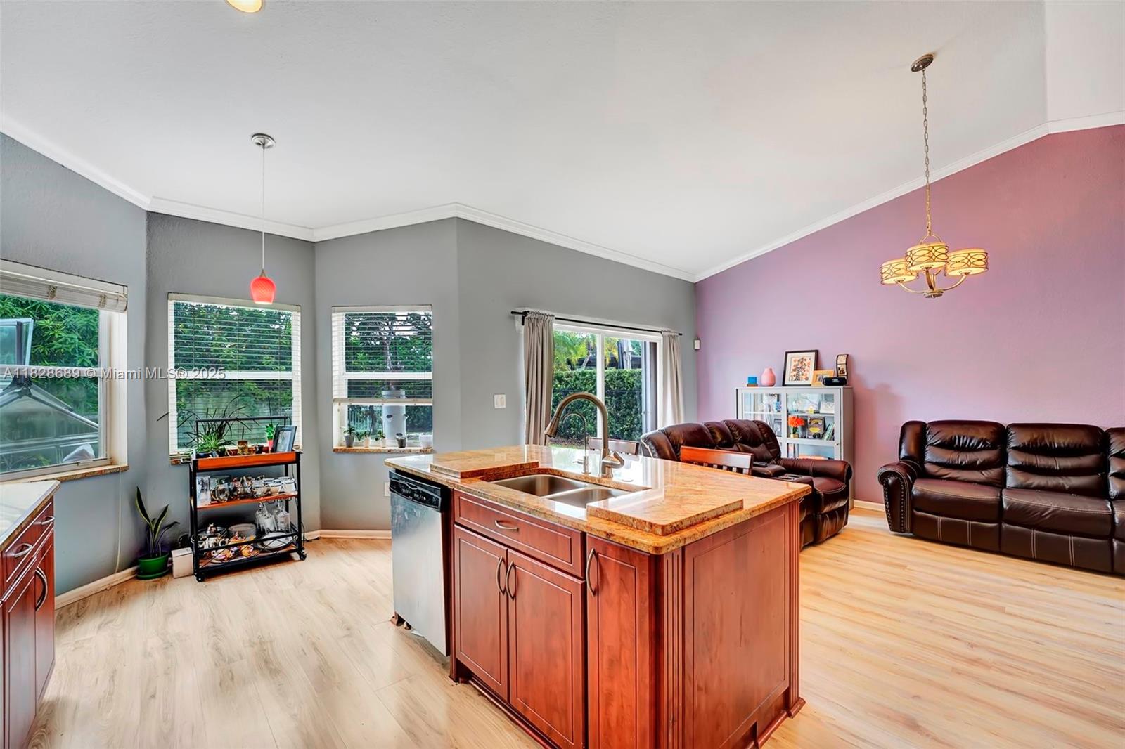 275 Southwest 198th Terrace Pembroke Pines, FL 33029 - Photo 17 of 35 a view of a workspace with furniture and a window