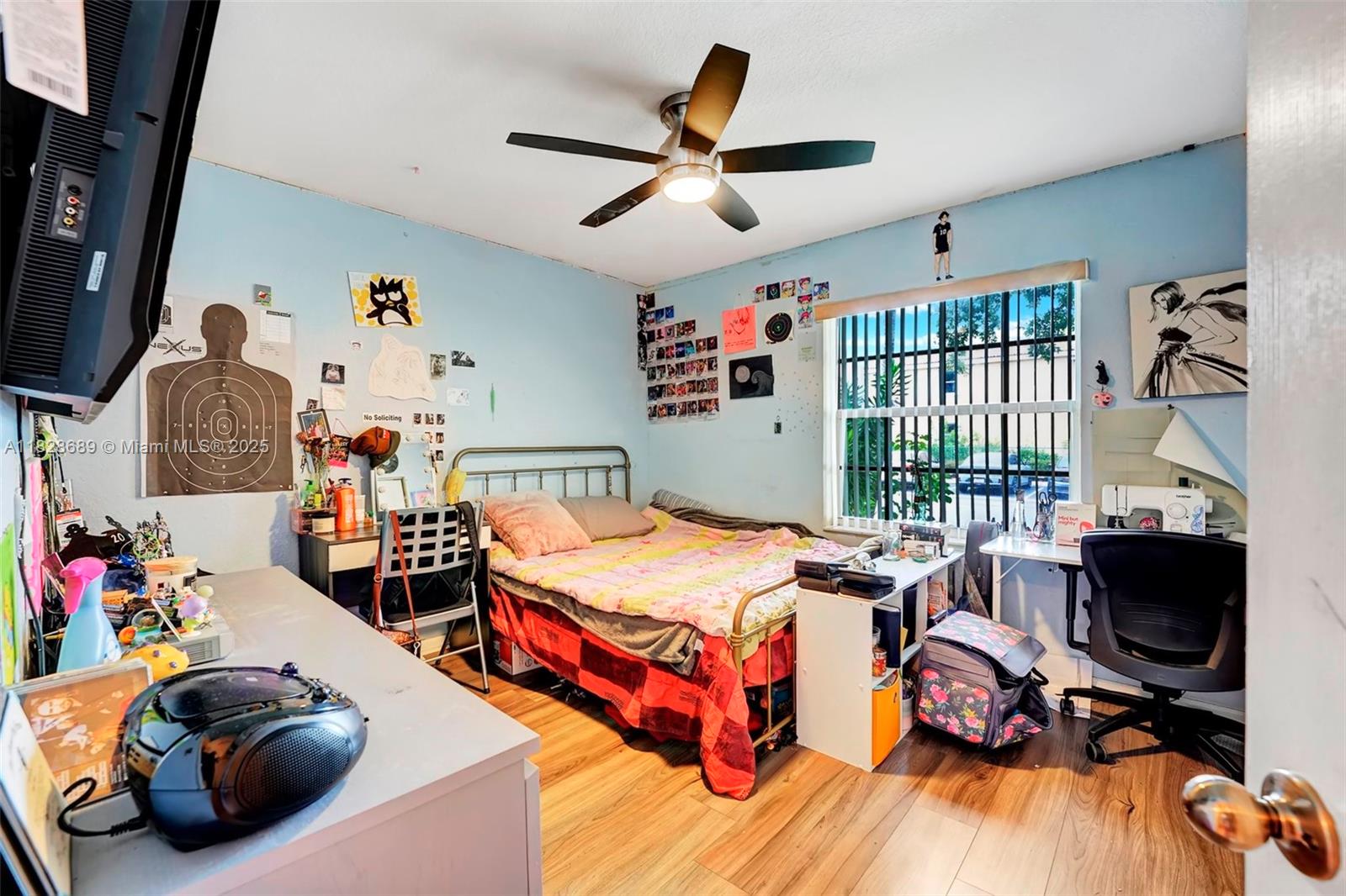 275 Southwest 198th Terrace Pembroke Pines, FL 33029 - Photo 19 of 35 a bedroom with bed and a window