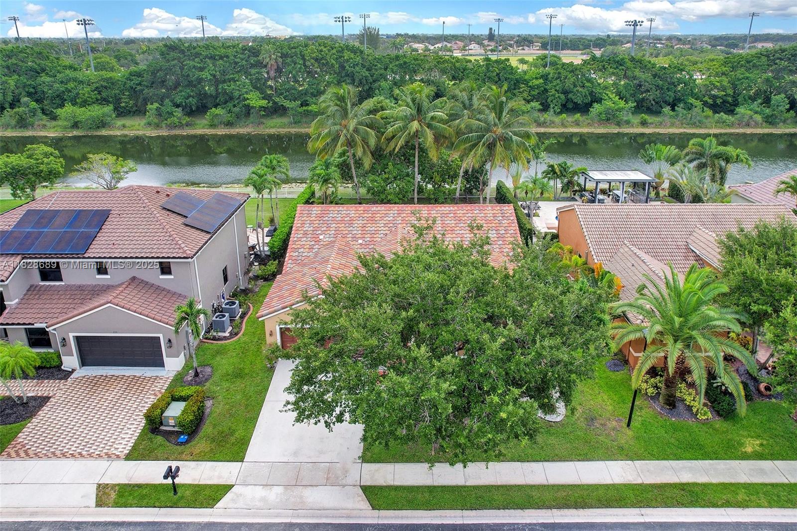 275 Southwest 198th Terrace Pembroke Pines, FL 33029 - Photo 29 of 35 an aerial view of a house with a yard and lake view