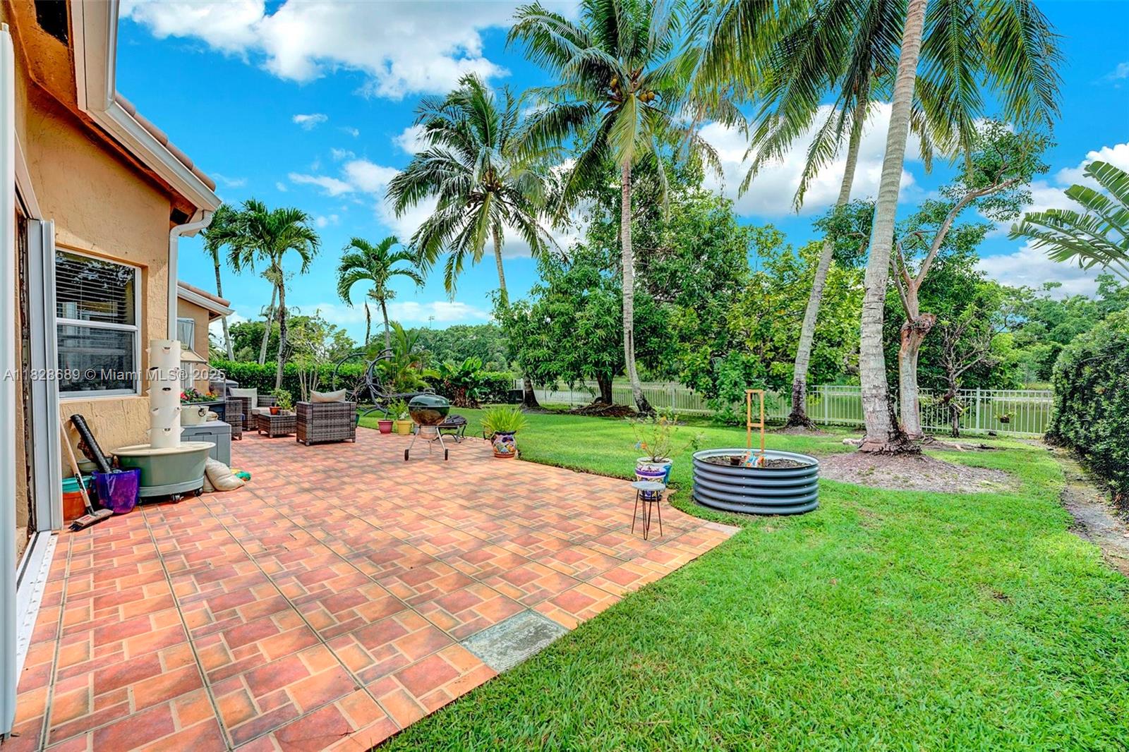 275 Southwest 198th Terrace Pembroke Pines, FL 33029 - Photo 5 of 35 a view of outdoor space yard and patio