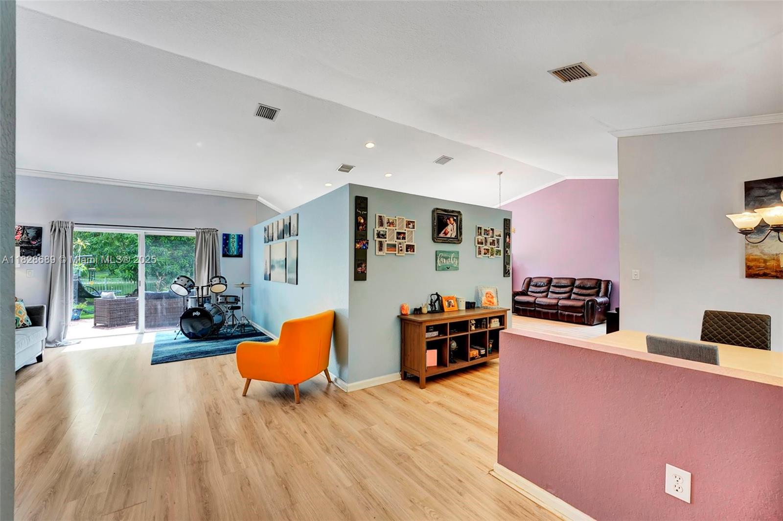 275 Southwest 198th Terrace Pembroke Pines, FL 33029 - Photo 8 of 35 a living room with furniture and a wooden floor