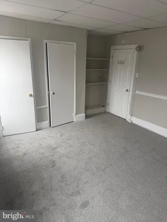 an empty room with closet