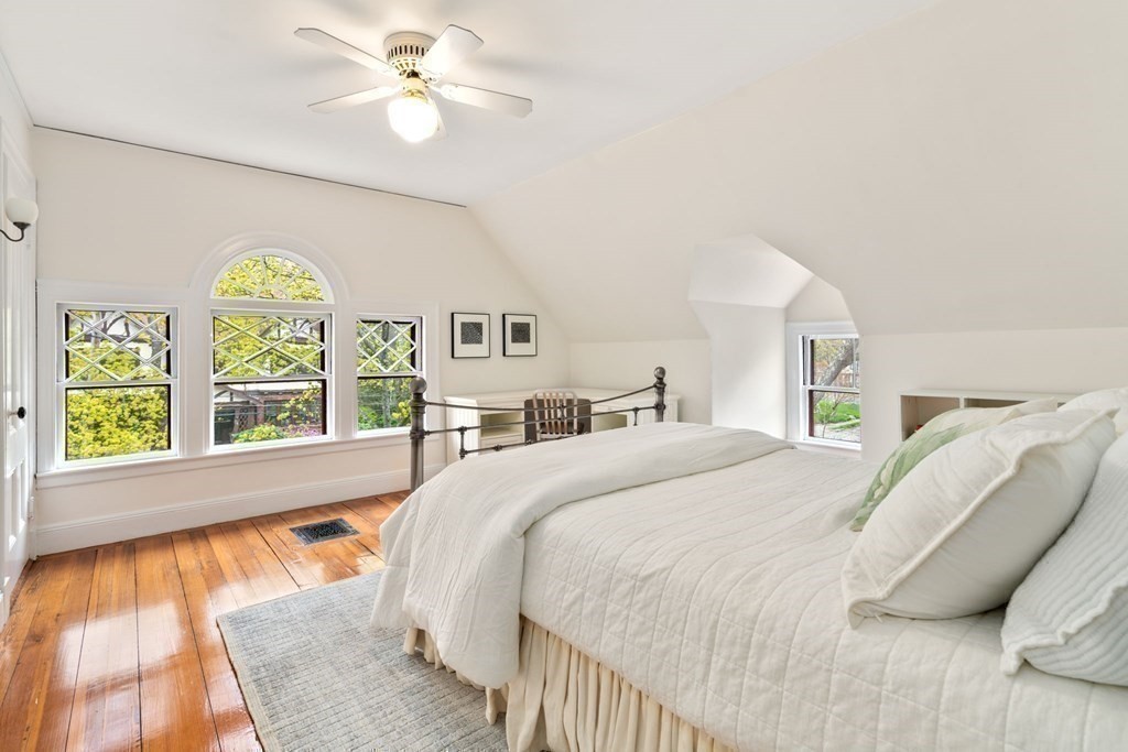 53 Oxford Road Newton, MA 02459 - Photo 22 of 32 a bedroom with a bed and a large window