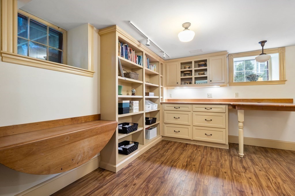 53 Oxford Road Newton, MA 02459 - Photo 29 of 32 a room with cabinet and window