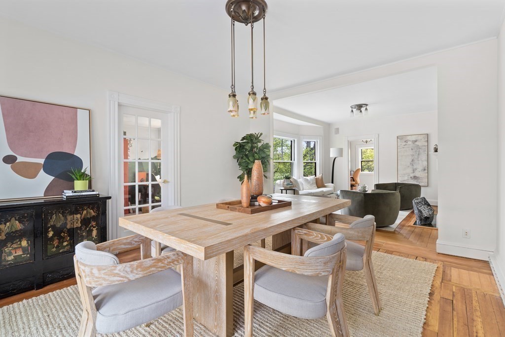 53 Oxford Road Newton, MA 02459 - Photo 8 of 32 a view of a dining room with furniture and chandelier
