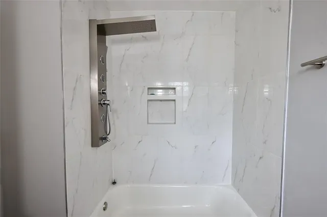 a bathroom with a bathtub