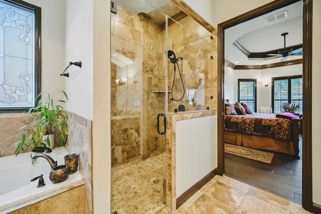 a view of living room with furniture and a fireplace