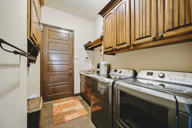 a kitchen with stove cabinets and refrigerator
